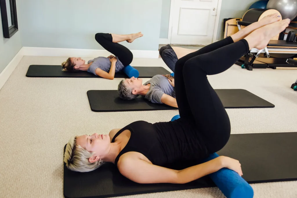 women doing pilates on exercise mats 2022 03 07 23 54 09 utc